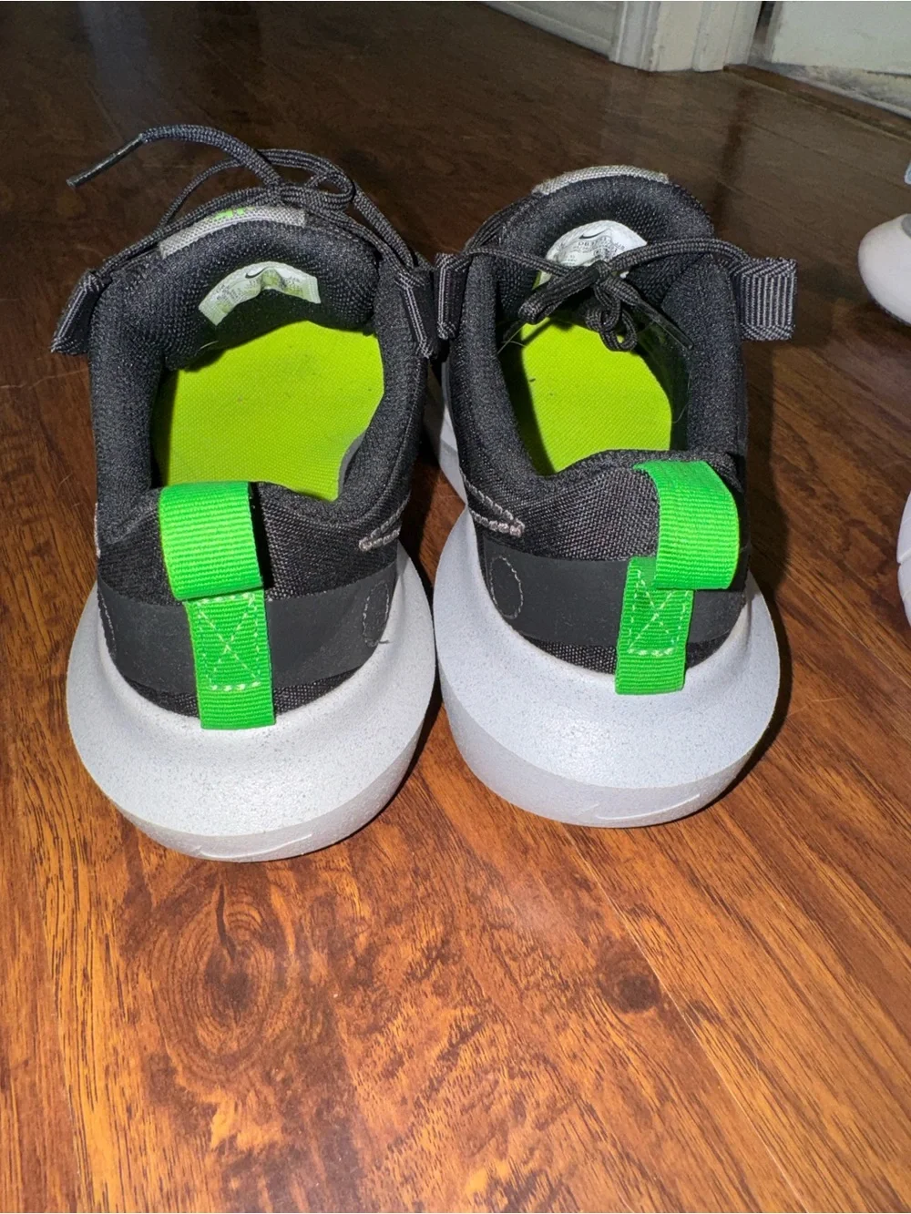 Nike Black Sneakers with Neon Green Heel Tabs